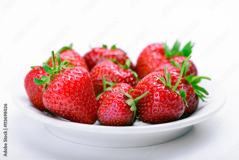 Strawberries on a white plate Strawberries on a white plate