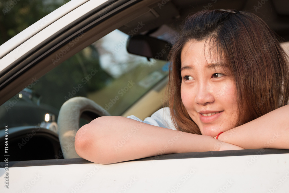 Asian girl in the car