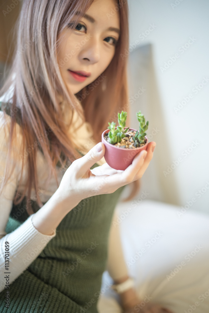 portrait of attractive asian girl in coffee shop portrait of attractive asian girl in coffee shop