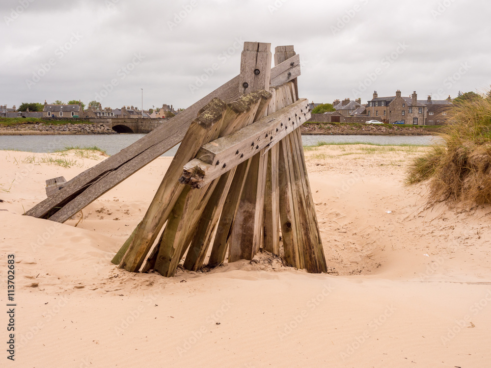 Wooden groynes on the beach at Lossiemouth, Morray Firth, Scotland, UK, Wooden groynes on the beach at Lossiemouth, Morray Firth, Scotland, UK,