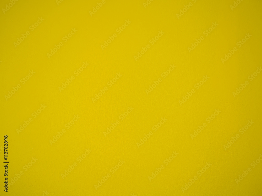 Obraz premium Abstract yellow cement wall background