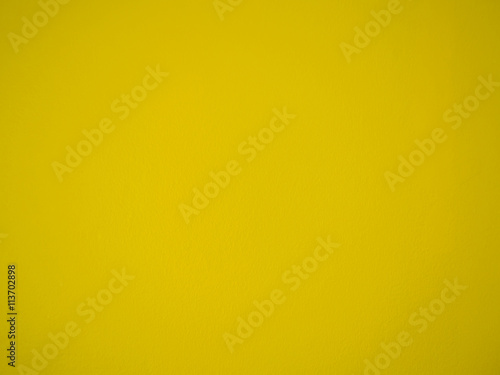 Abstract yellow cement wall background