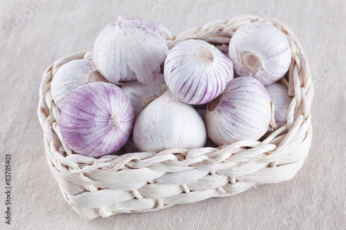 Fresh garlic in a small basket