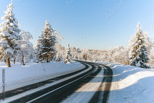 Snow road turn trees winter nobody sun © matousekfoto