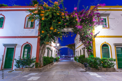 Architecture of Puerto de Mogan at night, a small fishing port on Gran Canaria, Spain.