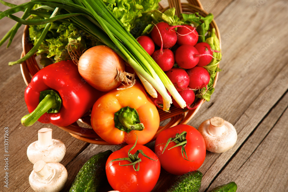 Vegetables . Fresh Bio Vegetable in a Basket. Over Nature Background