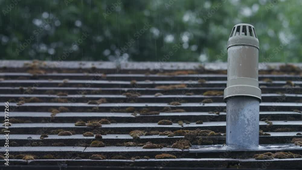 4K Raindrops falling on a rooftop 4K Raindrops falling on a rooftop