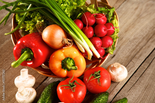 Vegetables . Fresh Bio Vegetable in a Basket. Over Nature Background