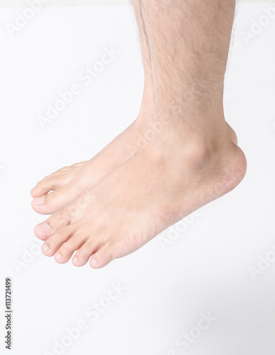 man feet isolated on white background © Khwanchai