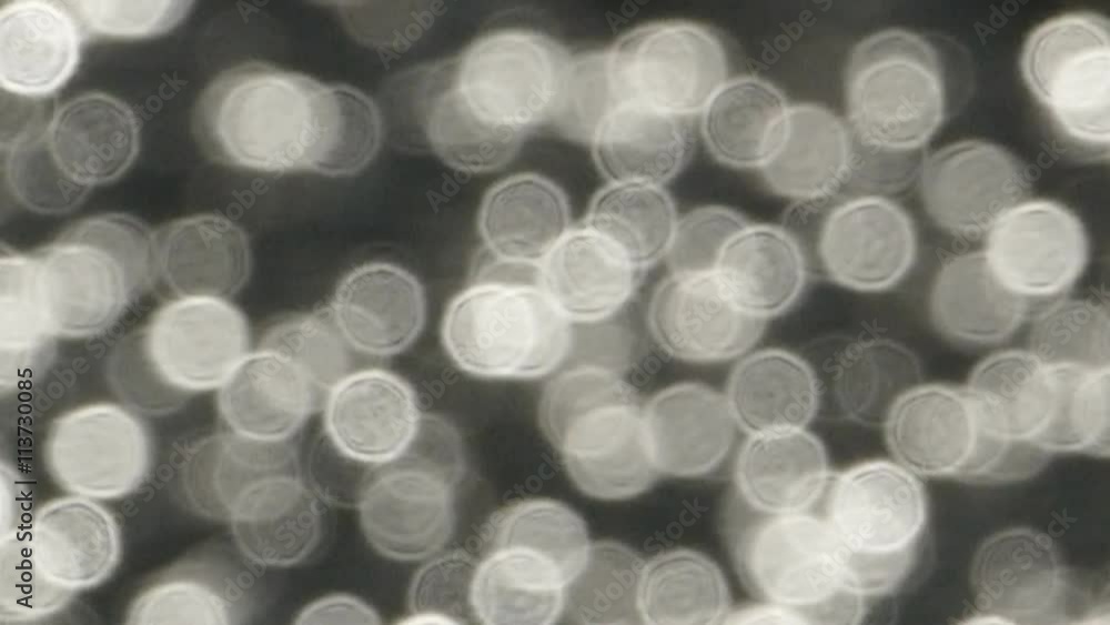Movement of black and white bokeh, reflections water surface.
