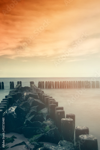 Beautiful beach  sea and breakwater