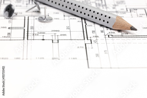 architectural background with technical drawing and pencil