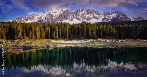 Dolomites Lake landscape with forrest mountain, Lago di Carezza,