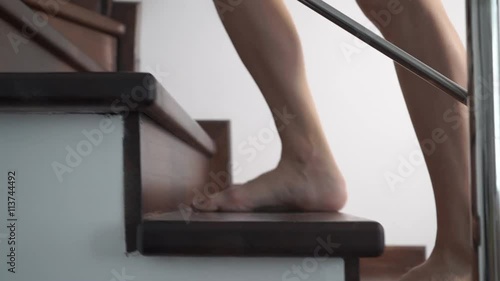 Female feet walking upstairs and downstairs closeup video