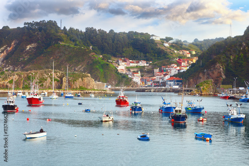 Boats in the fishing port from Cudillero, Asturias, Spain photo