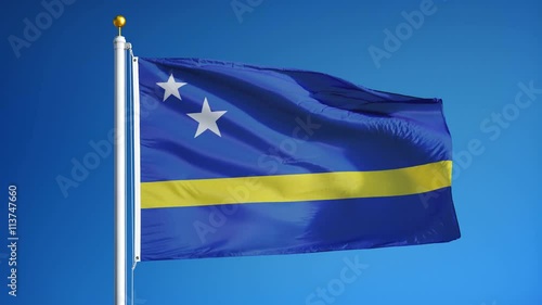 Curaçao flag waving in slow motion against blue sky, seamlessly looped, close up, isolated on alpha channel with black and white luminance matte, perfect for film, news, digital composition photo