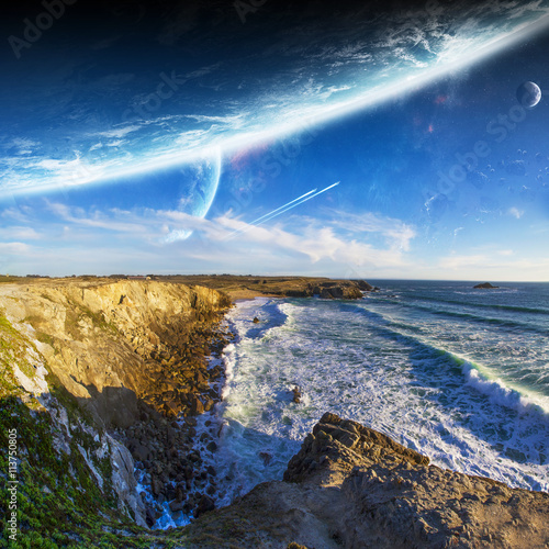 Fototapeta Naklejka Na Ścianę i Meble -  View of distant planet system from cliffs