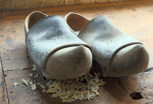 old Dutch style wooden clogs in the workshop of a shoemaker