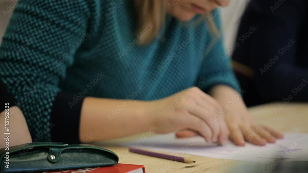 Woman uses pencil and eraser to draw nice picture Woman uses pencil and eraser to draw nice picture