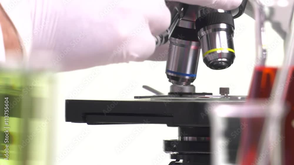 magnification change lens to a microscope magnification change lens to a microscope