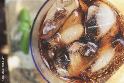 Cola with ice cubes