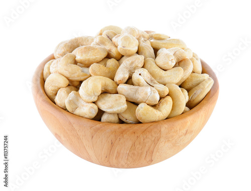 cashew nut in wood bowl on white background