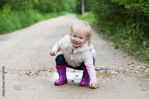 Happy smiling portrait of a 2 year old blonde girl © Maria Medvedeva