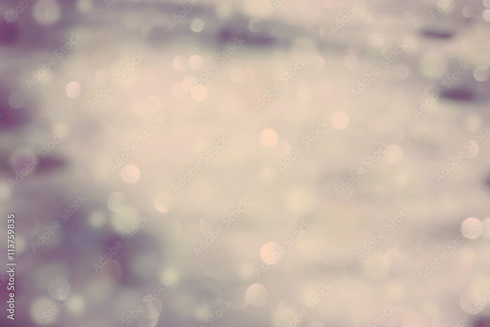 Obraz premium Real snow bokeh background texture, vintage look. Blurred lights. 