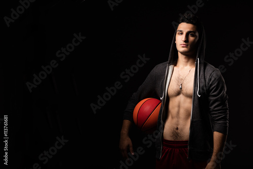 Teenage boy with basket ball
