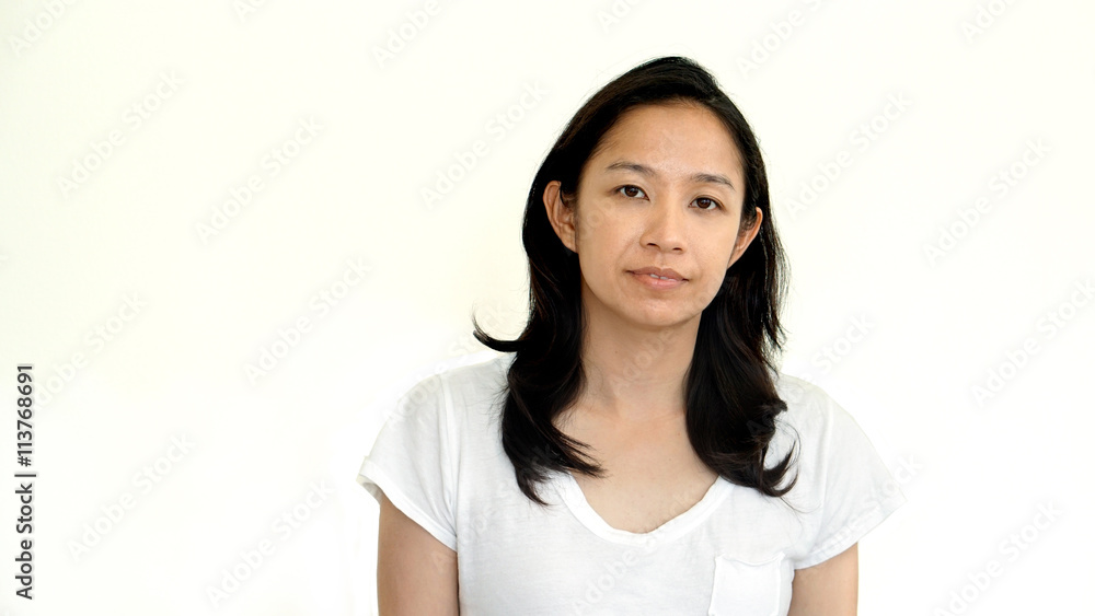 Casual asian girl on white background smiling face with relax te Casual asian girl on white background smiling face with relax te