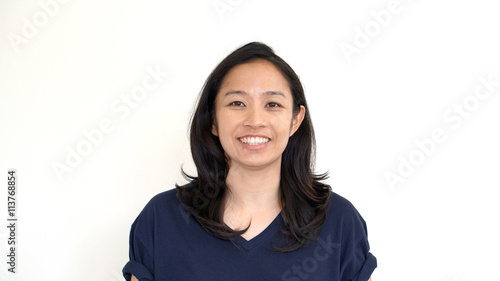 Casual asian girl on white background smiling face with relax te