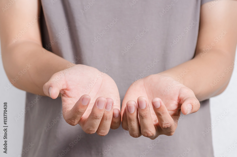 Man offer hand and holding nothing Man offer hand and holding nothing