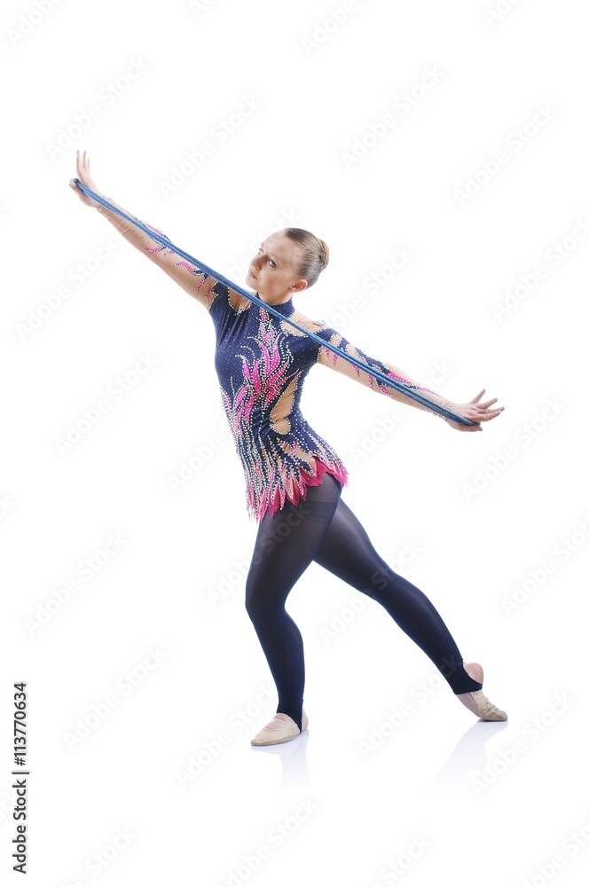 Obraz premium Beautiful artistic female gymnast working out, performing art gymnastics element