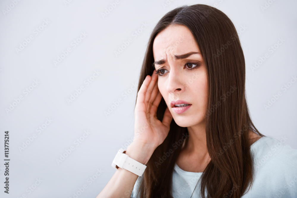 Sick woman having a headache Sick woman having a headache