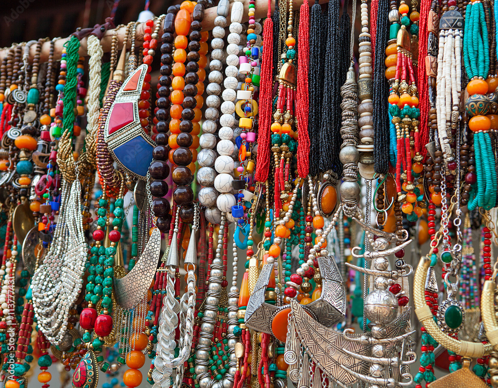 jewelry in row of necklaces and bracelets