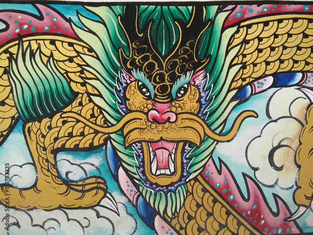 Painting dragon on the wall in temple of Thailand