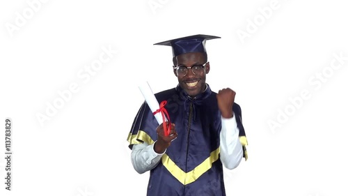 Graduate holding a diploma. Slow motion. White