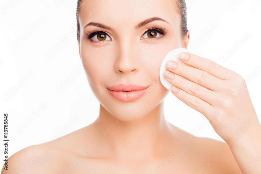 Pretty sensitive girl  wash off makeup with cotton pad