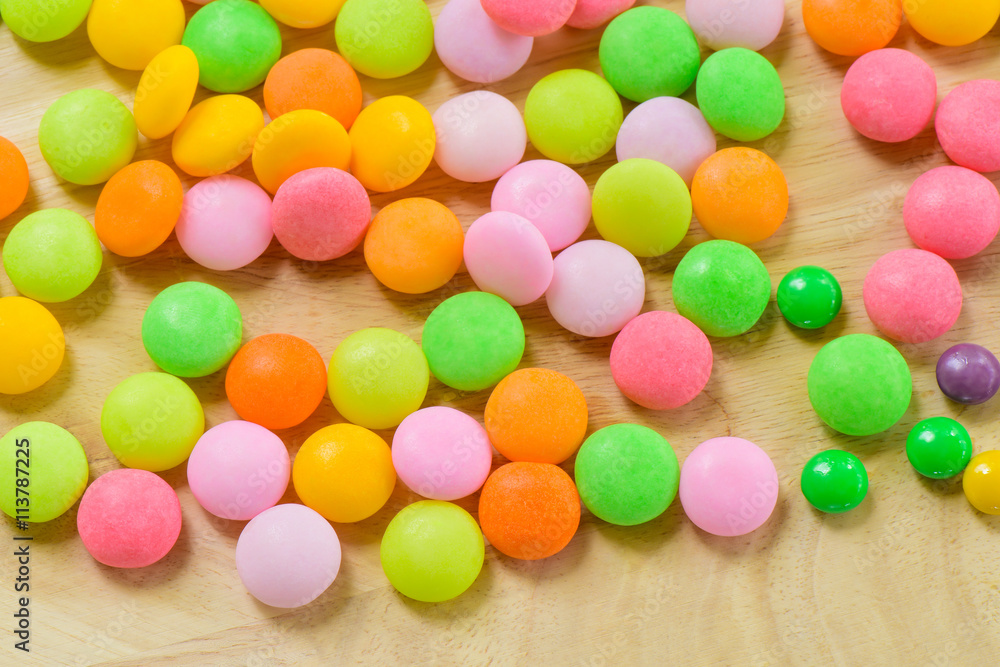 Colourful sugary candy on the table, Multicolour sugary candy for background, Colourful heart shape sugary candy Colourful sugary candy on the table, Multicolour sugary candy for background, Colourful heart shape sugary candy