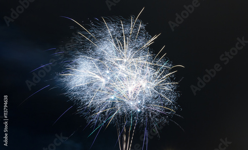 Fireworks burst on holiday or celebration.