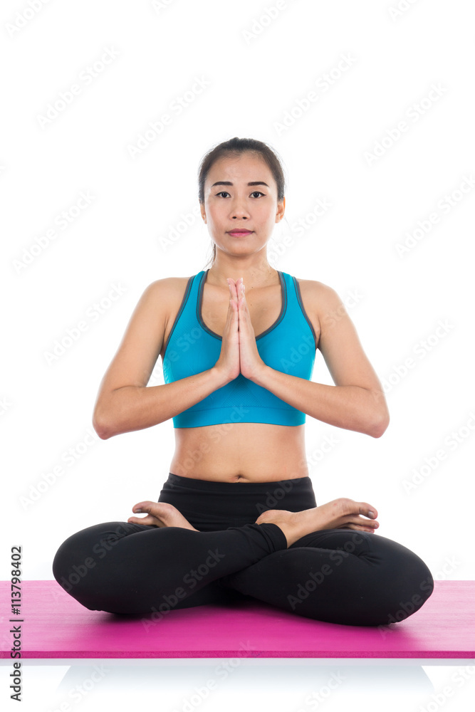 Yoga woman - pretty asian female in active wear doing yoga Yoga woman - pretty asian female in active wear doing yoga