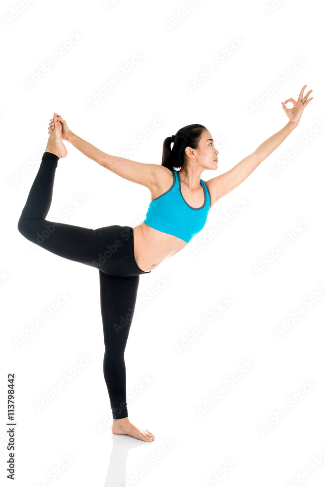 Yoga woman - pretty asian female in active wear doing yoga