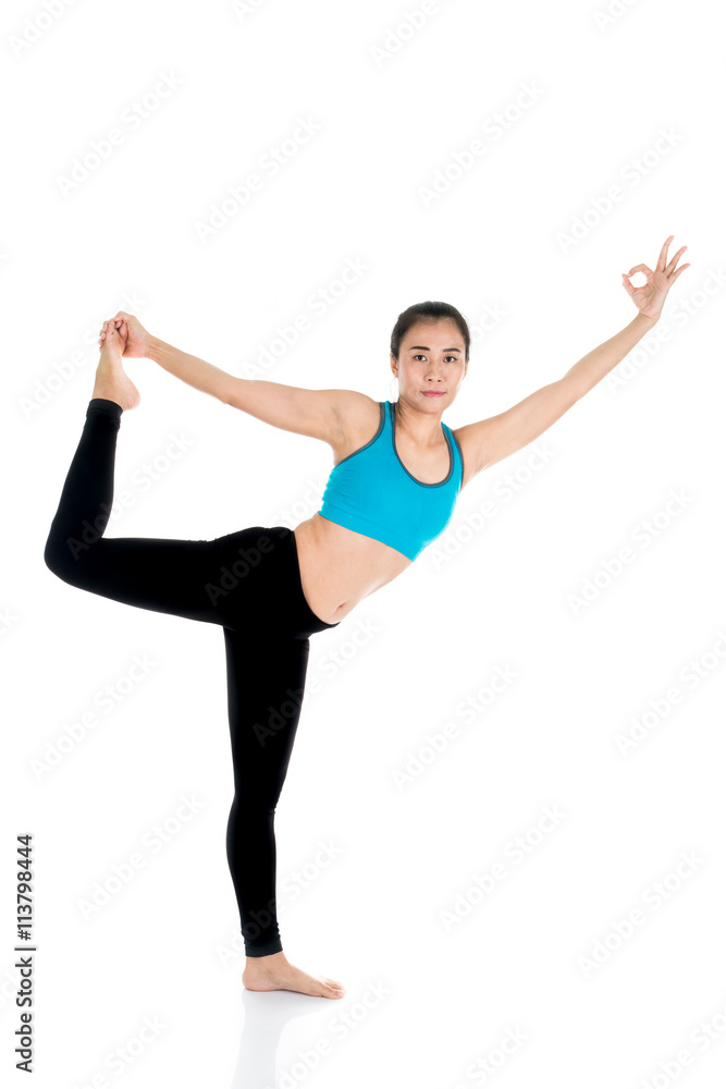 Yoga woman - pretty asian female in active wear doing yoga Yoga woman - pretty asian female in active wear doing yoga