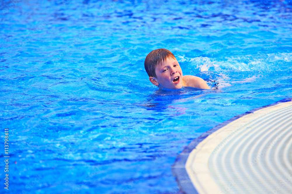 Children swimming in the pool