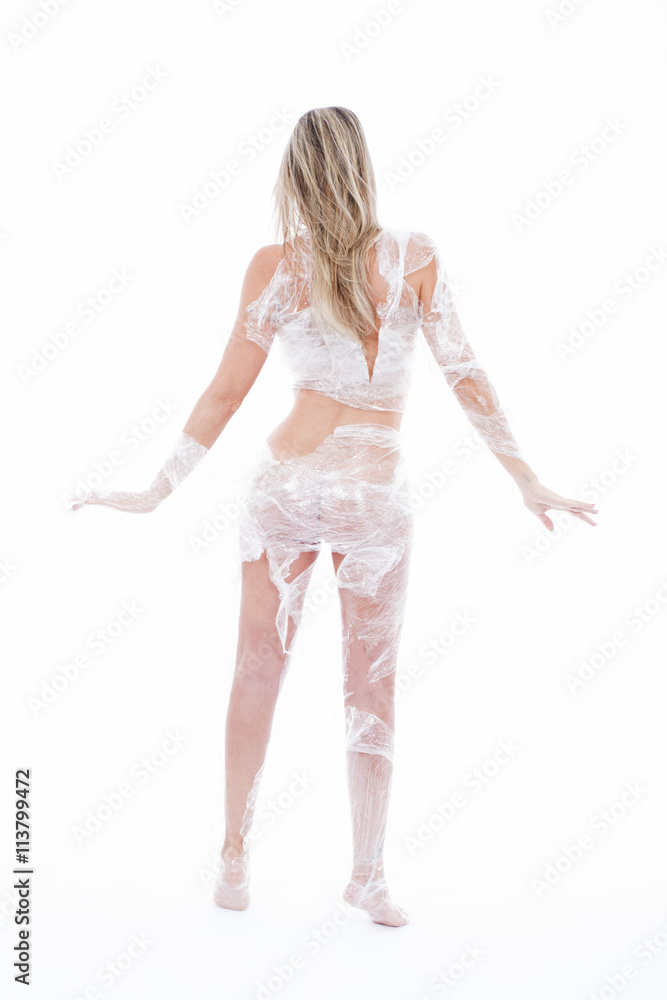 Woman wrapped in transparent film Woman wrapped in transparent film