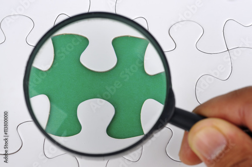 Magnifying Glass On Missing Puzzle