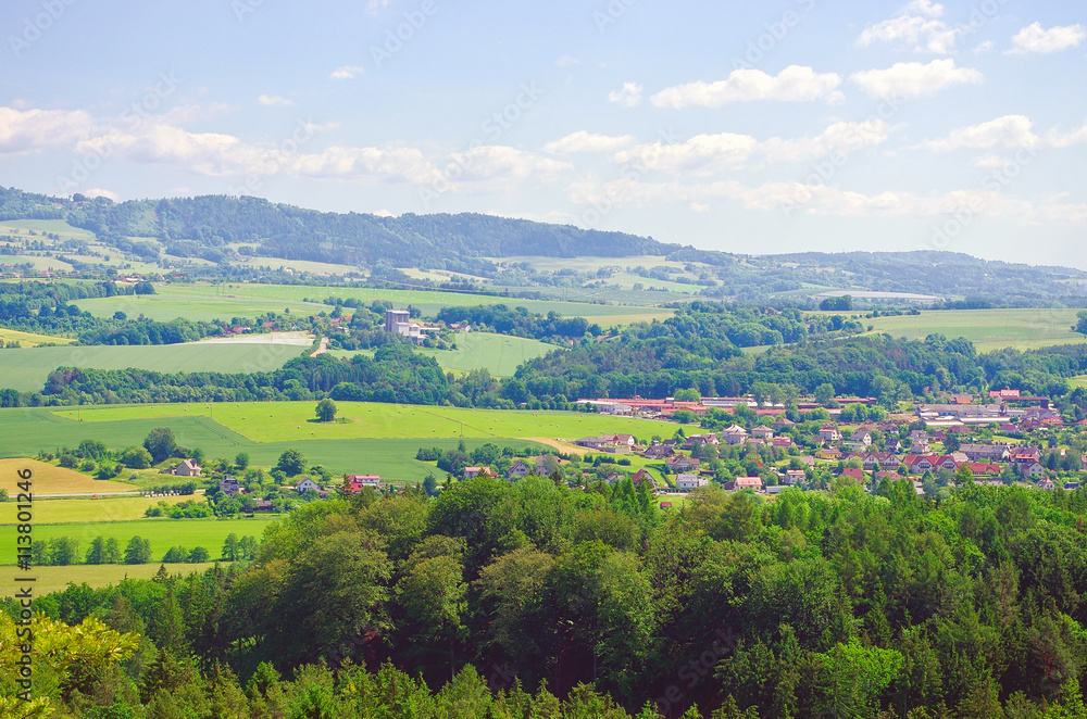 Obraz premium Czech landscape with mountains, clouds and trees