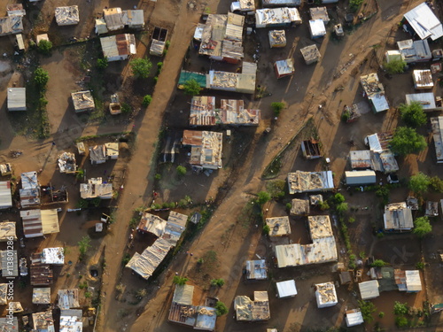 South African township with tin shacks from above photo