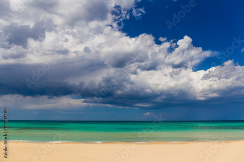 Amazing golden sand beach near Monopolli Capitolo  amazing atmosphere during stormy day  Apulia region  Southern Italy