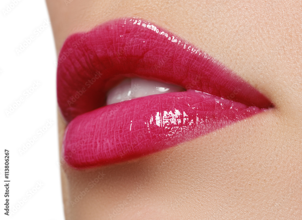 Obraz premium Beautiful full pink lips. Lipstick. Professional make-up